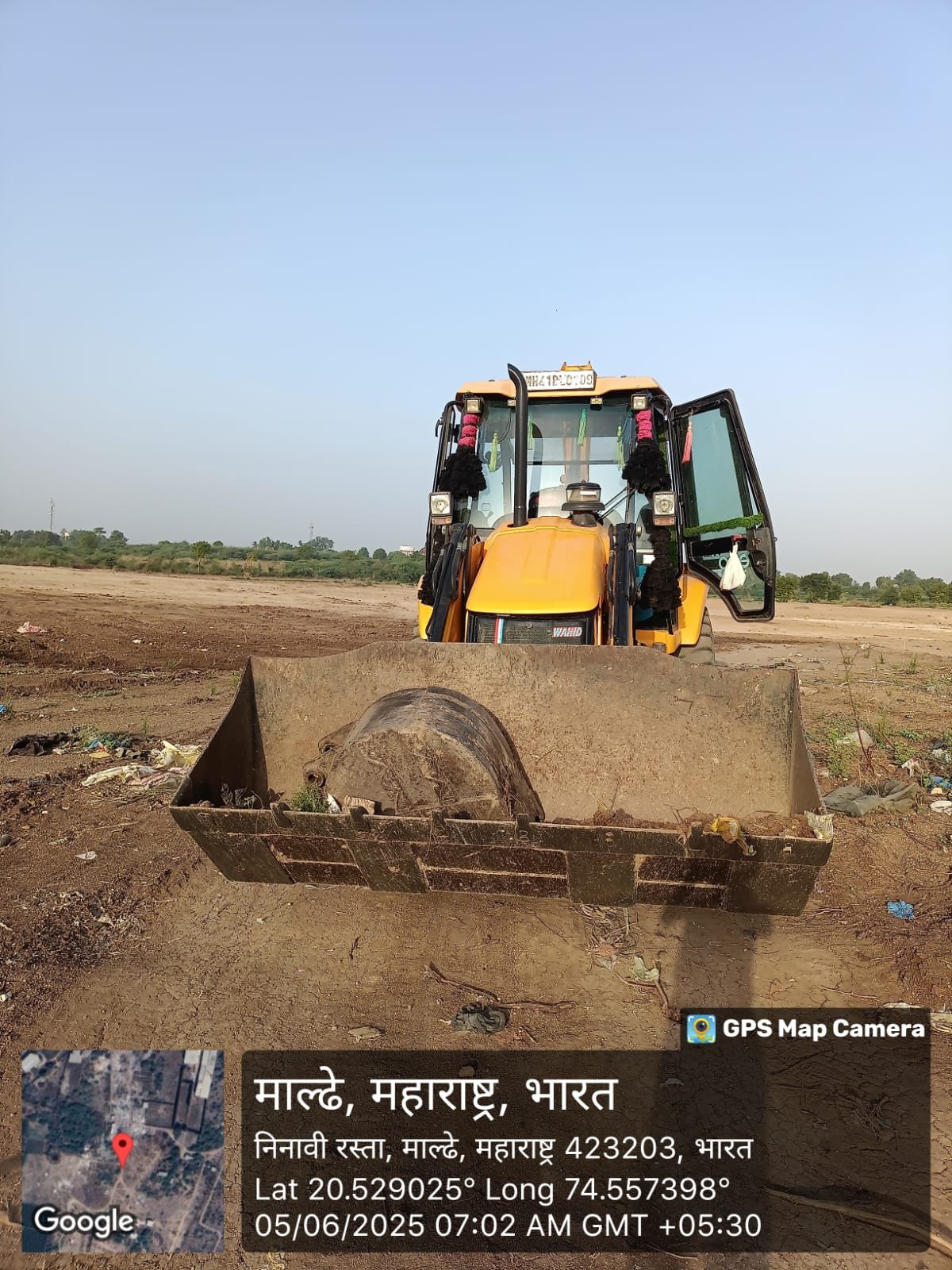 JCB returing after work in Malegaon